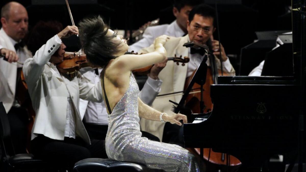 Yuja Wang, seen here performing Prokofiev at the Hollywood Bowl last summer, will be back for a go at Gershwin as part the venue's 2016 season.