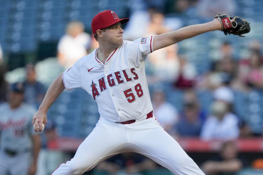 Los Angeles Angels starting pitcher Davis Daniel throws during the first inning.