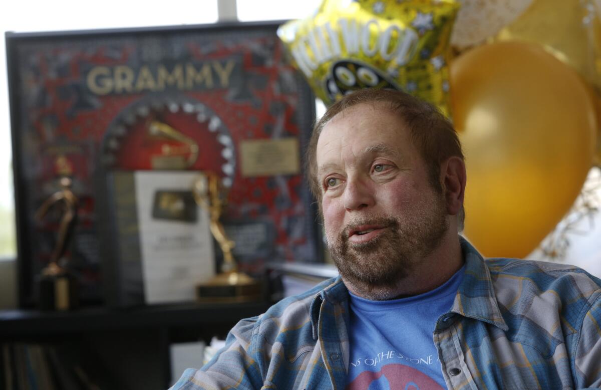 "I'm still competitive. I think about ... what we could do better, and it drives me to work harder," Ken Ehrlich says of the Grammys telecast. "It energizes me."