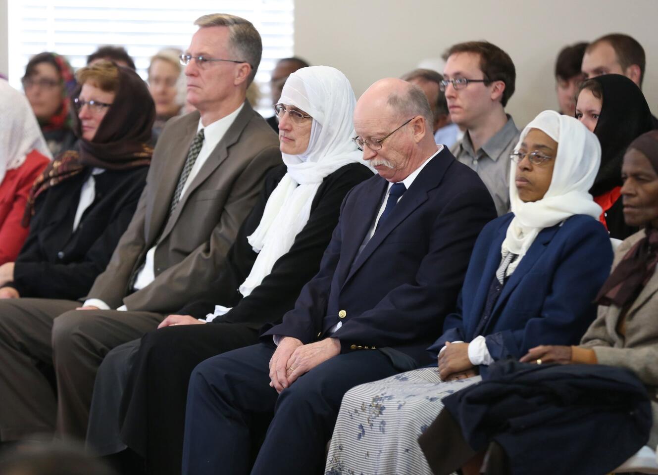 Paula and Ed Kassig attend a prayer service in memory of their son Abdul-Rahman Kassig, whose name was Peter before his conversion to Islam, in Fishers, Indiana.