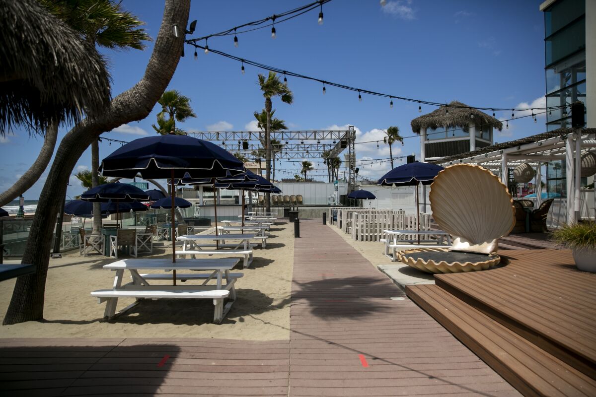 Preparations are underway to reopen dine-in service at the Beach House Grill at Belmont Park in Mission Beach.