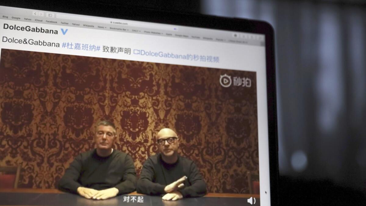 Dolce & Gabbana founders Stefano Gabbana, left, and Domenico Dolce apologize in a video that appeared on Chinese social media.