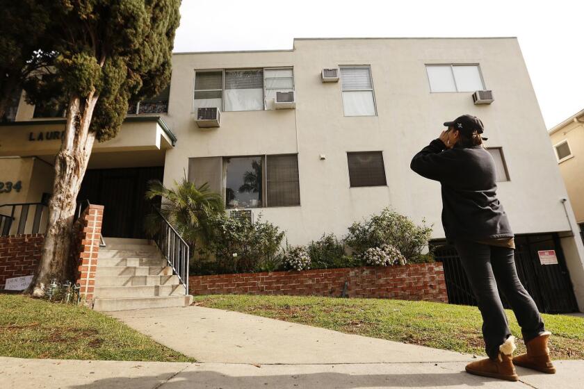 WEST HOLLYWOOD, CA - JANUARY 08, 2019 Neighbor Jackie Tepper, yells at the second floor corner unit of prominent West Hollywood LGBT political activist Ed Buck in a building located at 1234 N. Laurel Ave in West Hollywood where the body of a second overdose victim was recovered. In both cases, African American men were found dead inside the home of Ed Buck. Tepper yelled at Buck who she believes is in the apartment Tuesday morning to leave the neighborhood (Al Seib / Los Angeles Times)