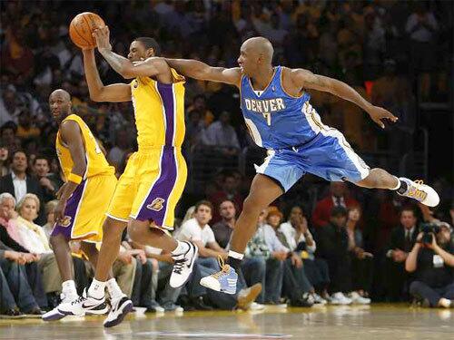 Lakers forward Trevor Ariza steals an inbounds pass in front of Nuggets point guard Chauncey Billups in the final minute of Tuesday night's game.