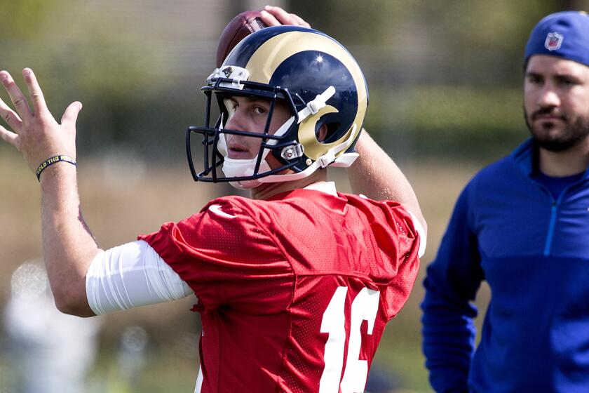 Quarterback Jared Goff participates in a passing drill during the Rams' rookie mini-camp in Oxnard on May 6.