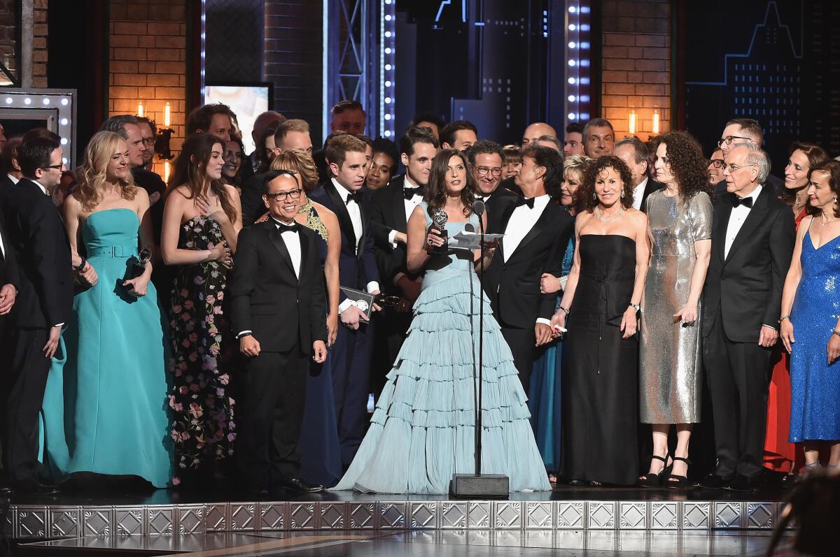 Producer Stacey Mindich, at the microphone, and the cast of "Dear Evan Hansen" accept the award for best musical at the conclusion of the 2017 Tony Awards.