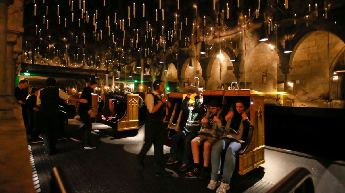 Candlesticks float above the riders on Harry Potter and the Forbidden Journey at Universal Studios Hollywood. The park, which had removed the 3-D feature on the ride, is adding high-definition images.