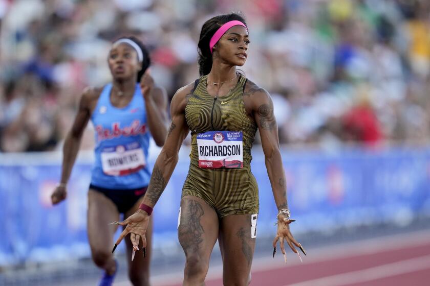 Sha'Carri Richardson wins a heat women's 100-meter run during the U.S. Track and Field Olympic.