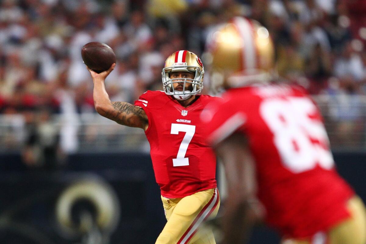 San Francisco quarterback Colin Kaepernick makes a pass during the first quarter of the 49ers' 35-11 victory over the St. Louis Rams on Thursday night.