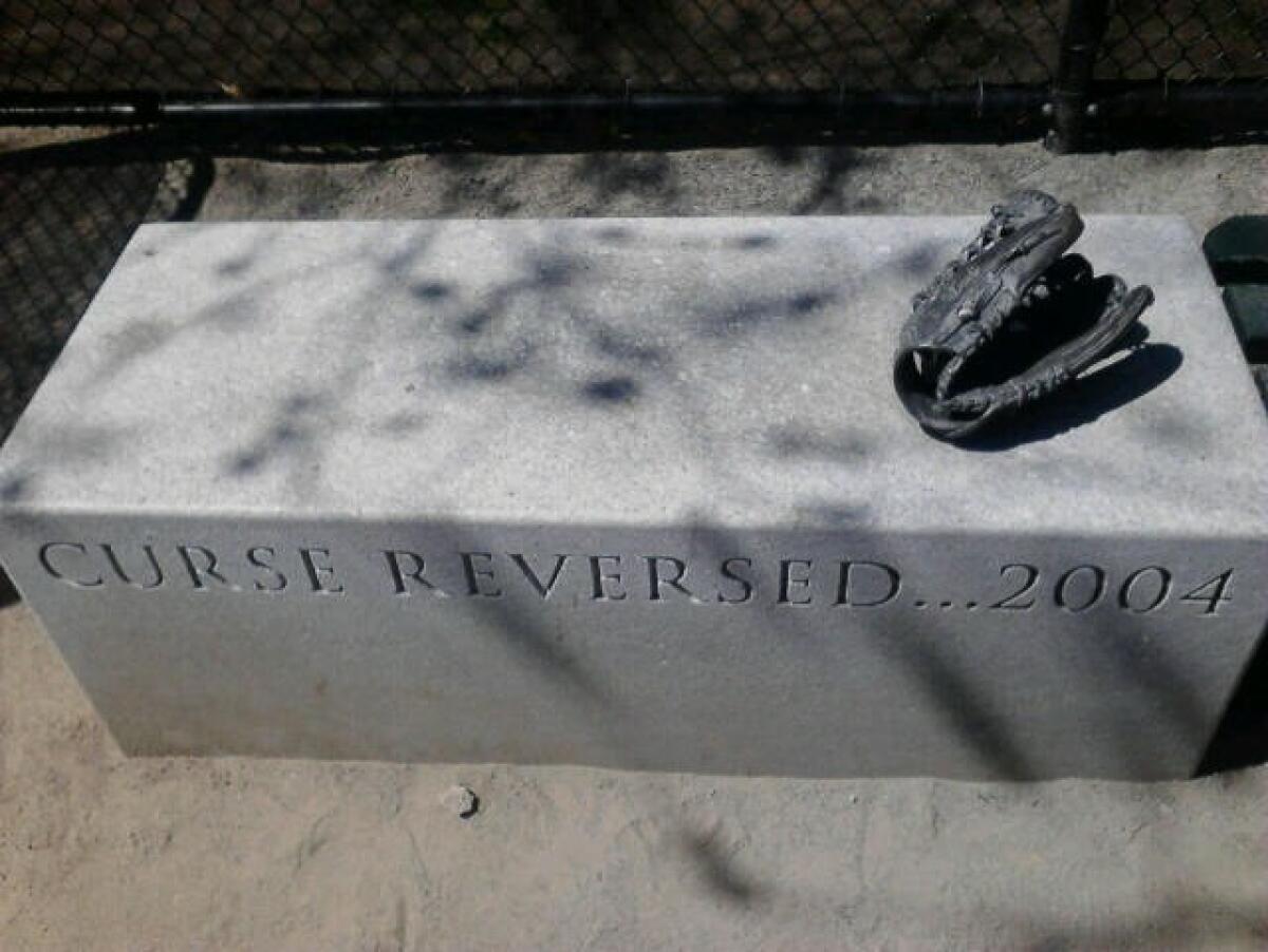 Teddy Ebersol's glove is commemorated on this granite bench at Teddy Ebersol's Red Sox Fields in Boston.