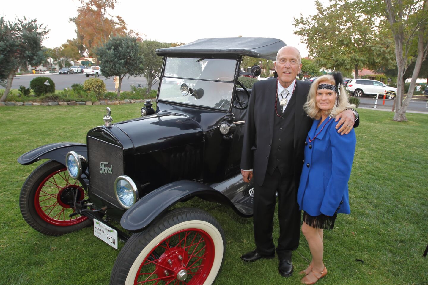 David Wilson and Jana Green pose by a 1925 Ford Model T