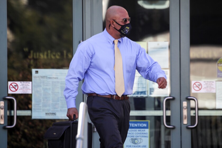 John Olivas leaves the federal courthouse in Riverside.