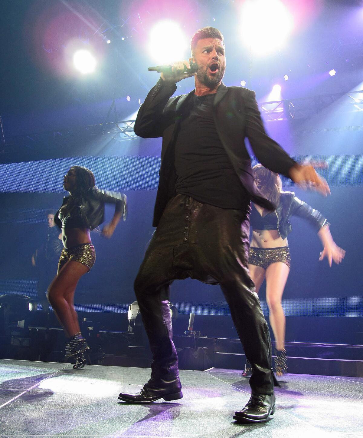 Singer Ricky Martin, seen here performing this month during the "KQ Live Concert" in San Juan, Puerto Rico, will perform at Moon Palace Golf & Spa Resort on Dec. 28.
