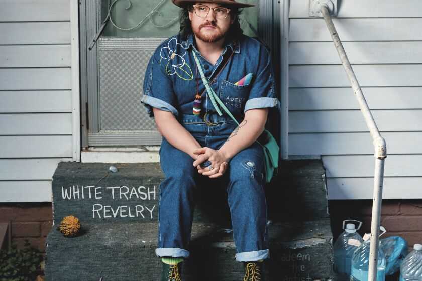 This cover image released by Four Quarters/Thirty Tigers shows “White Trash Revelry” by Adeem the Artist. (Four Quarters/Thirty Tigers via AP)