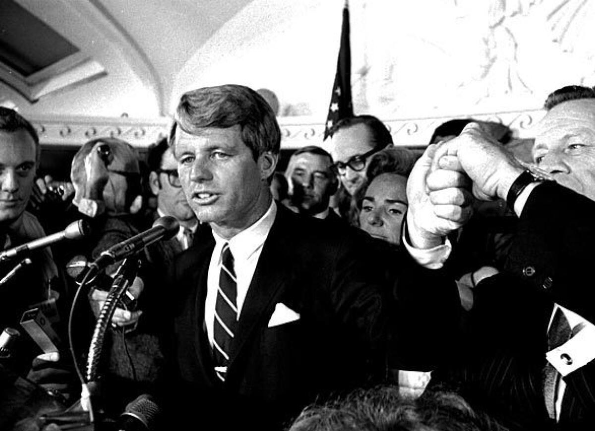 Sen. Robert F. Kennedy addresses a throng of supporters in the Ambassador Hotel in Los Angeles early on June 5, 1968
