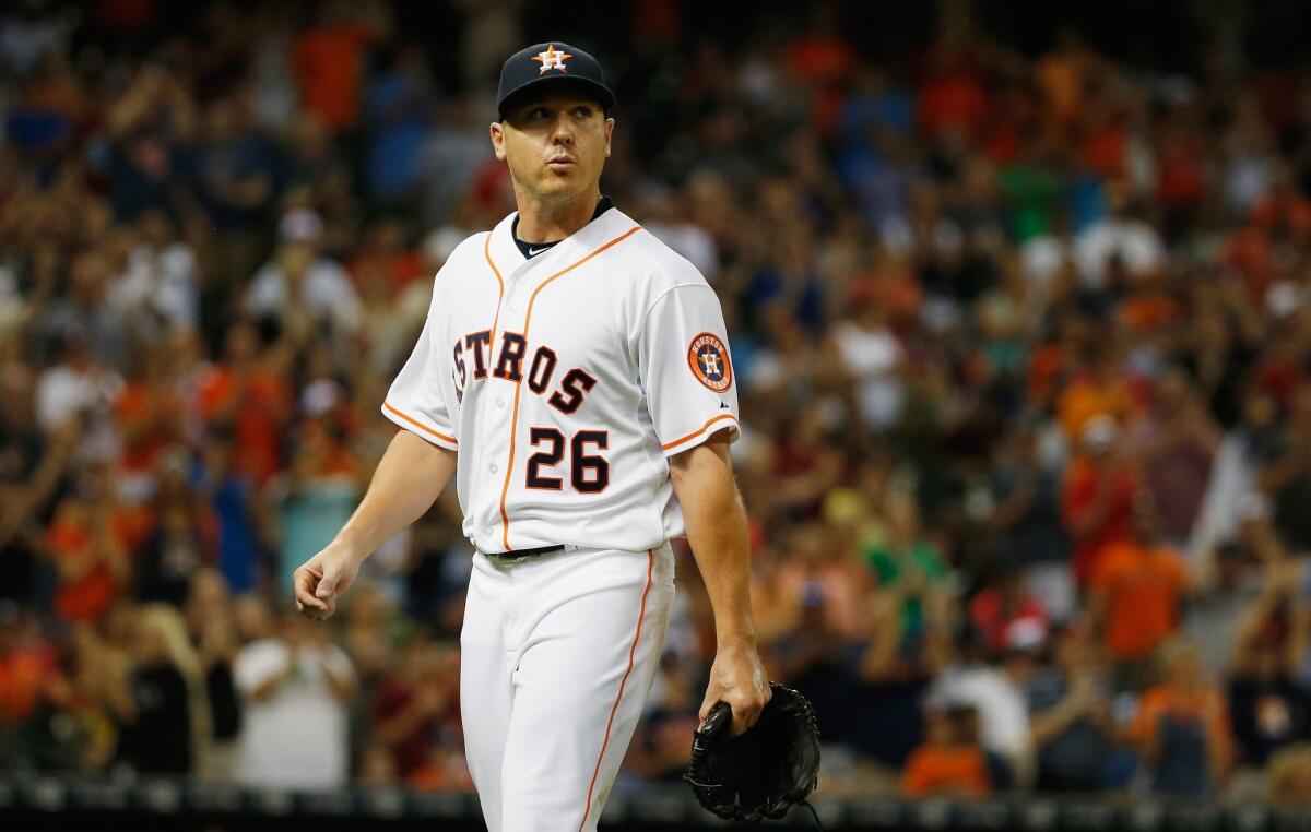 Scott Kazmir, then with the Astros, walks to the dugout during a July 30 game against the Angels at Minute Maid Park in Houston.