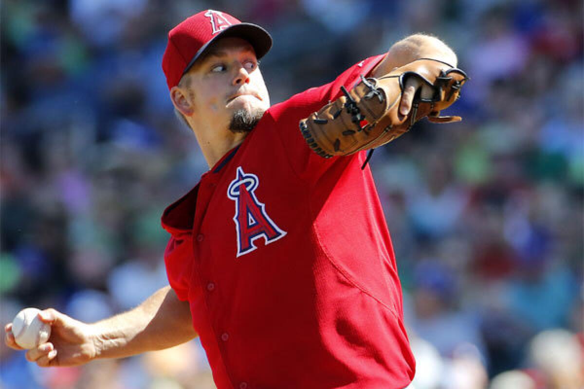 Angels pitcher Joe Blanton faces the Chicago Cubs Monday during an exhibition game in Mesa, Ariz.