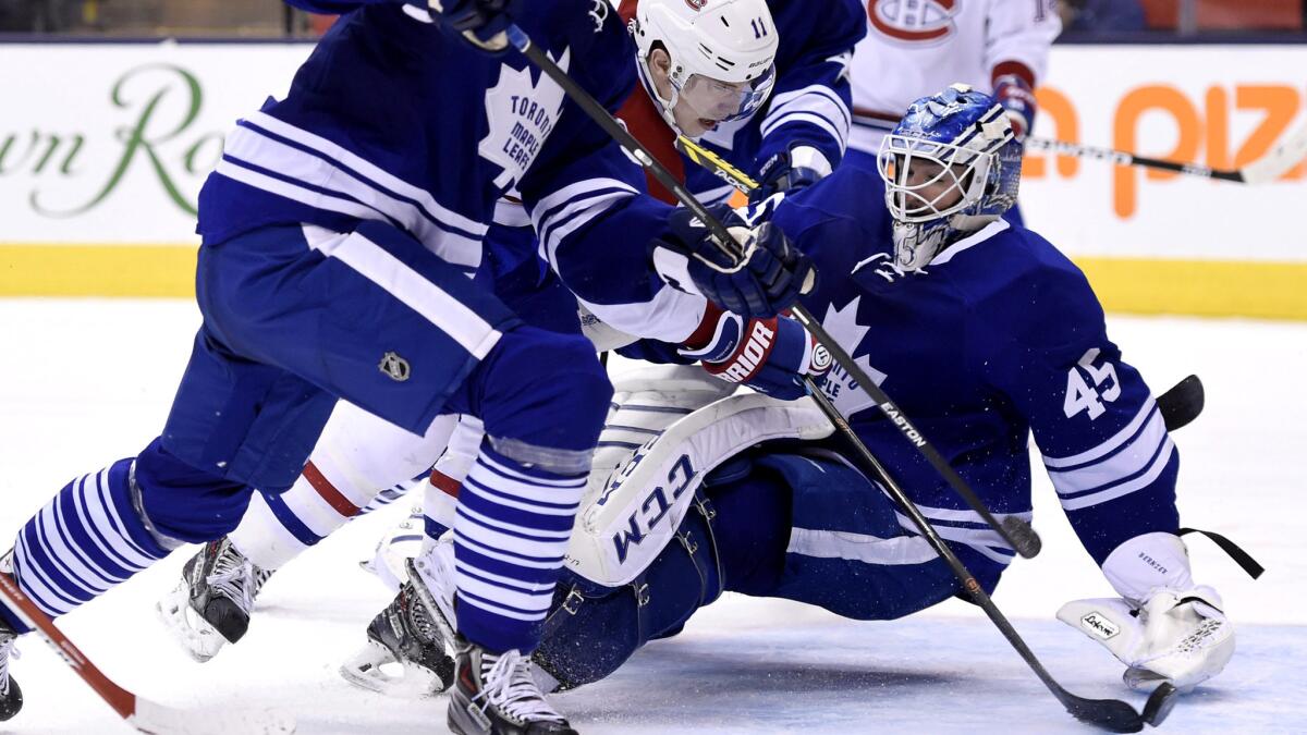 Montreal Canadiens winger Brendan Gallagher scores against Toronto Maple Leafs goalie Jonathan Bernier during a game in Toronto on April 11, but the goal was called off because of goaltender interference.