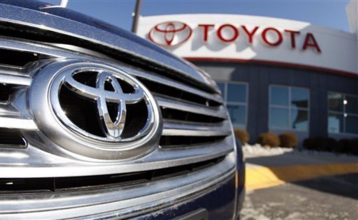 FILE - In this April 13, 2008 file photo, the company logo shines off the grille of an unsold 2008 Avalaon sedan at a Toyota dealership in the southeast Denver suburb of Centennial, Colo.Toyota Motor Sales (TMS), U.S.A., Inc., Friday, May 1, 2009, reported month-end sales of 126,540 vehicles, a decrease of 41.9 percent from last April, on a daily selling rate basis. (AP Photo/David Zalubowski, file)