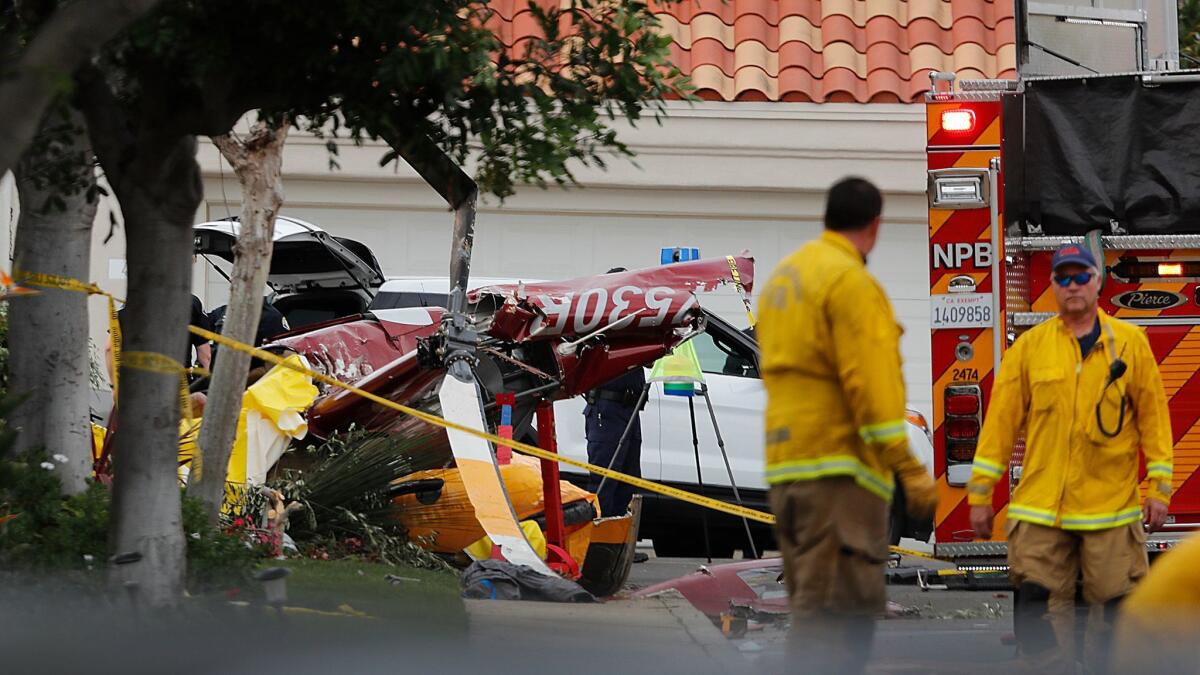 Three people were killed when a helicopter crashed in a Newport Beach neighborhood Tuesday, Jan. 30, 2018.