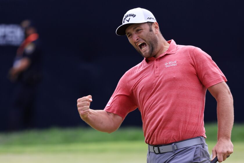 SAN DIEGO, CALIFORNIA - JUNE 20: Jon Rahm of Spain celebrates making a putt for birdie on the 18th green during the final round of the 2021 U.S. Open at Torrey Pines Golf Course (South Course) on June 20, 2021 in San Diego, California. (Photo by Sean M. Haffey/Getty Images)