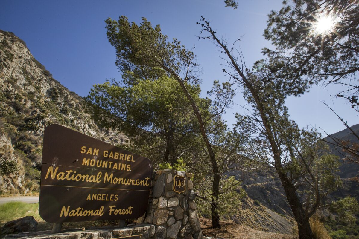 A sign is posted at the entrance to the San Gabriel Mountains National Monument.