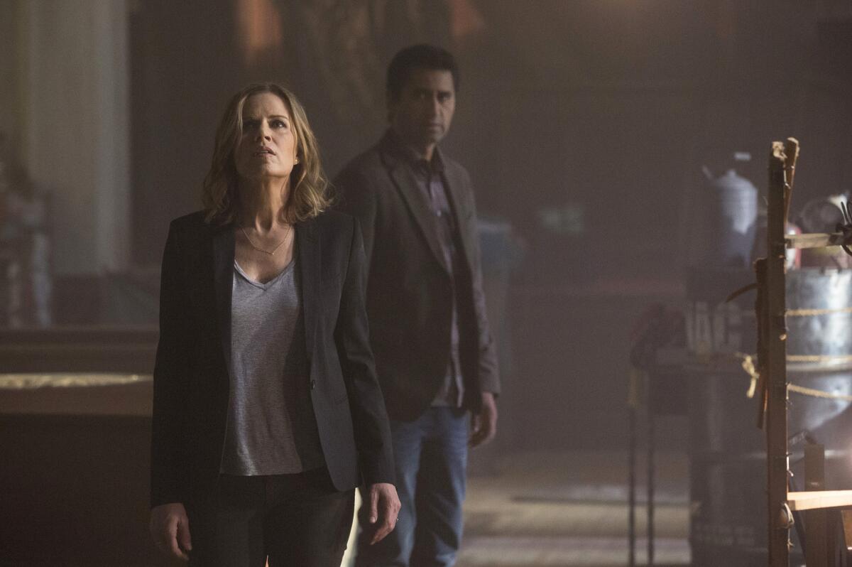 Kim Dickens, left, plays Madison and Cliff Curtis plays Travis in a scene from "Fear the Walking Dead."