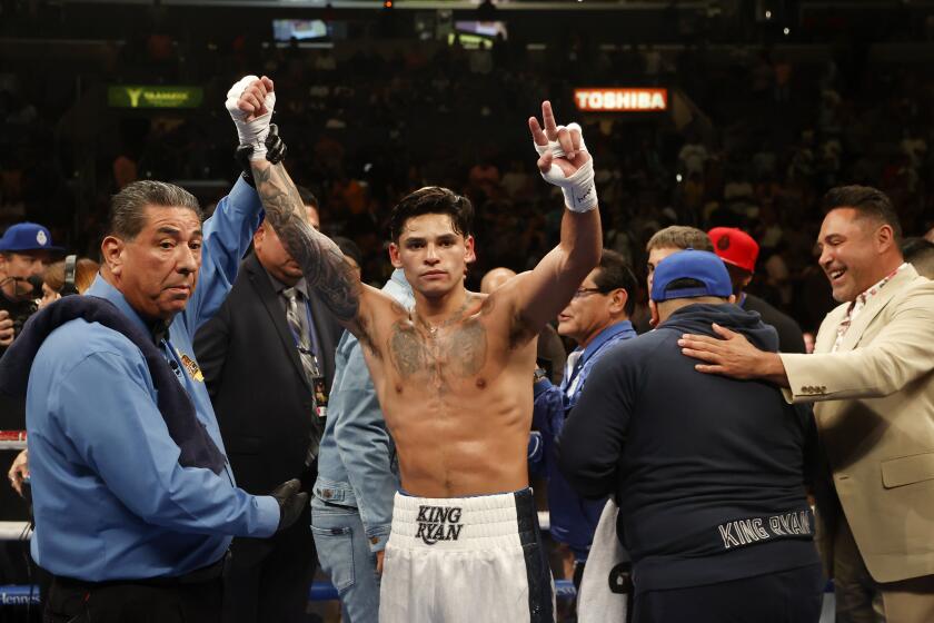 Ryan Garcia celebrates after defeating Javier Fortuna during the sixth round of a lightweight boxing match Saturday, July 16, 2022, in Los Angeles. (AP Photo/Ringo H.W. Chiu)