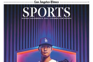 The cover of the L.A. Times sports section features an illustration of Shohei Ohtani