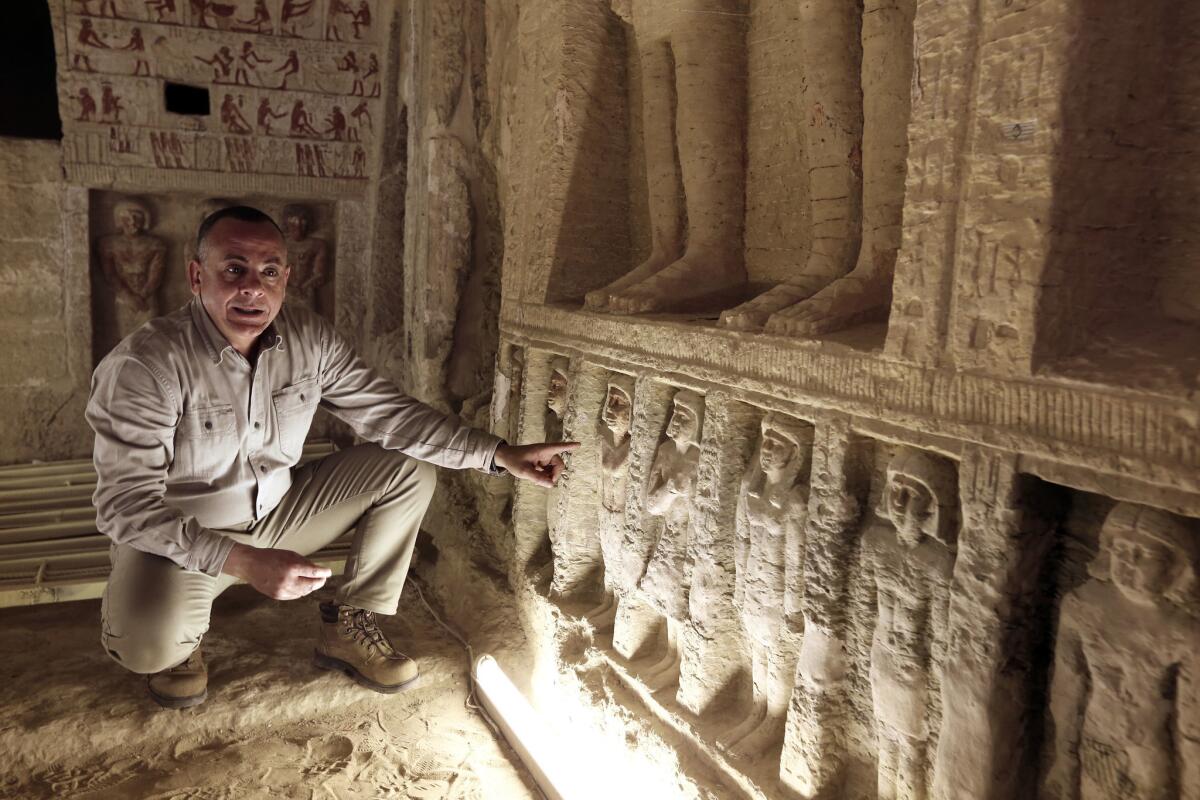 Mostafa Waziri, secretary-general of the Supreme Council of Antiquities, speaks Saturday inside the tomb of the high priest Wahtye at the site of the step pyramid in Saqqara, Egypt.