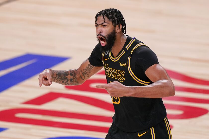 The Lakers' Anthony Davis celebrates during the second half of Game 5 of the NBA Finals on Oct. 9, 2020.