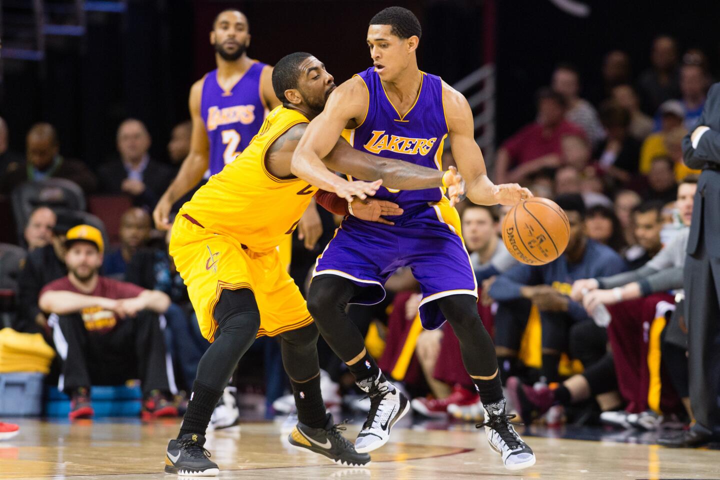 Cavaliers point guard Kyrie Irving tries to steal the ball from Lakers point guard Jordan Clarkson in the second half.