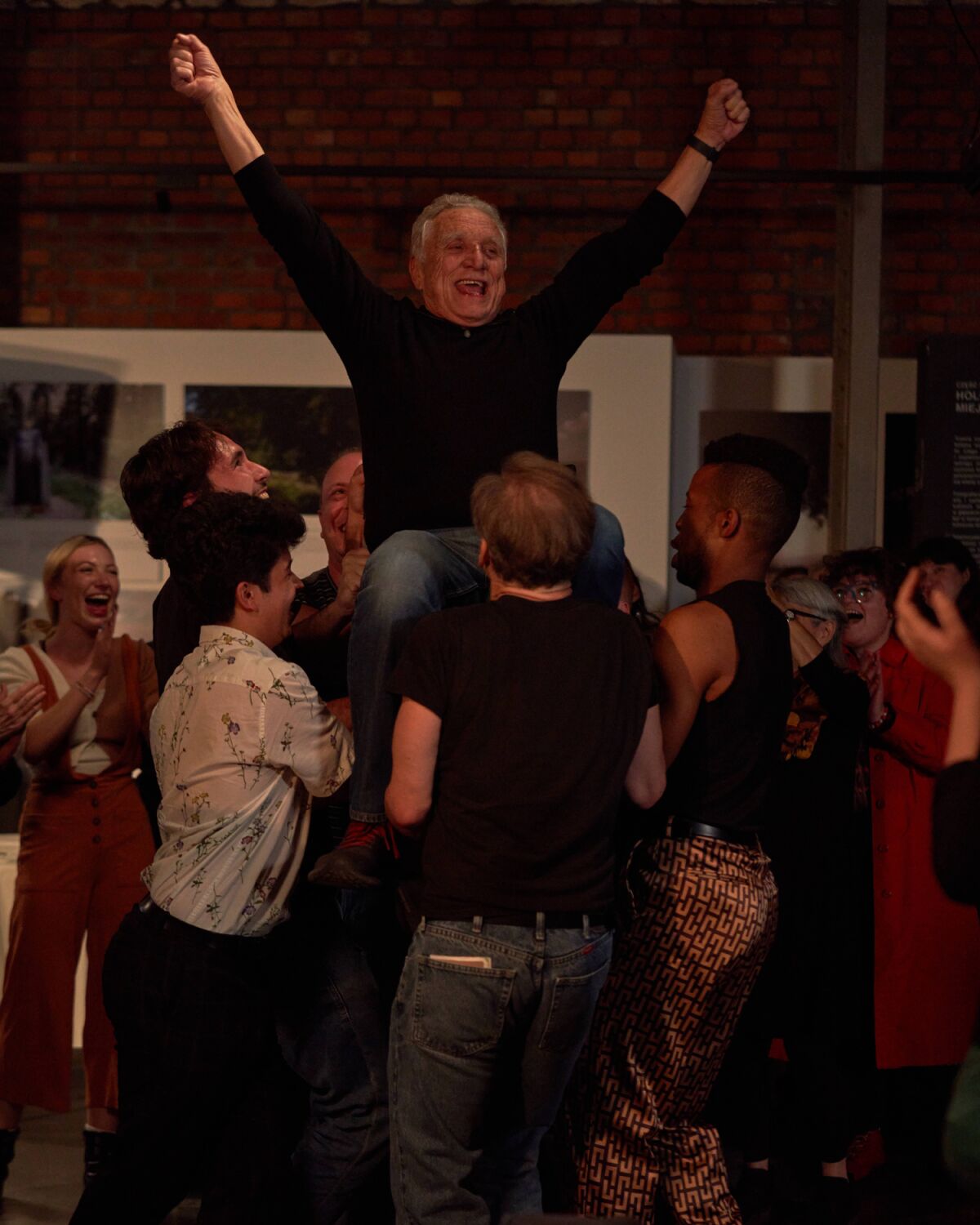 Moses Libitzky dances with students during filming of "The Assembly" in Krakow, Poland.