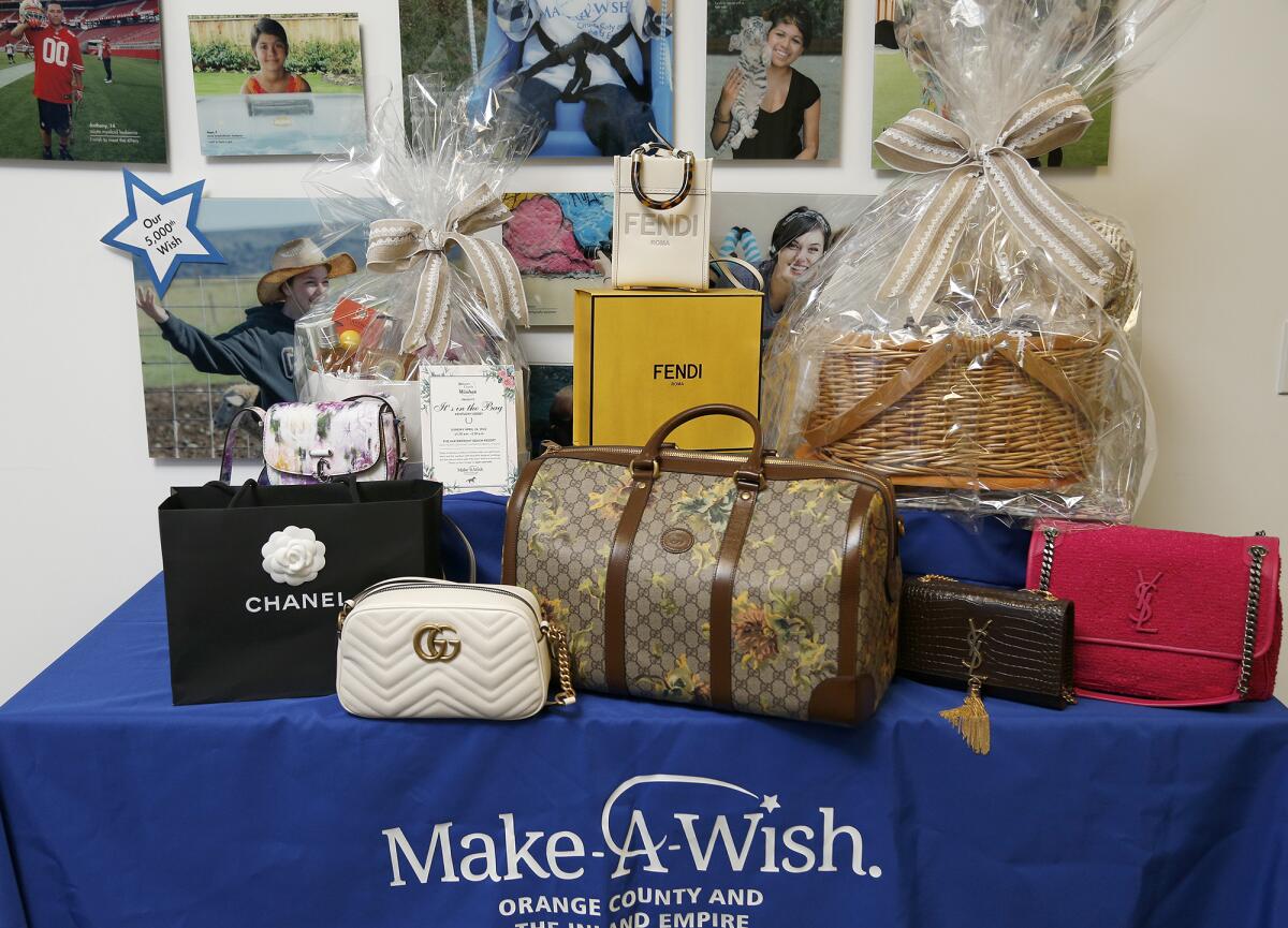 Items up for auction at Sunday's event include high-end luxury handbags and jewelry.