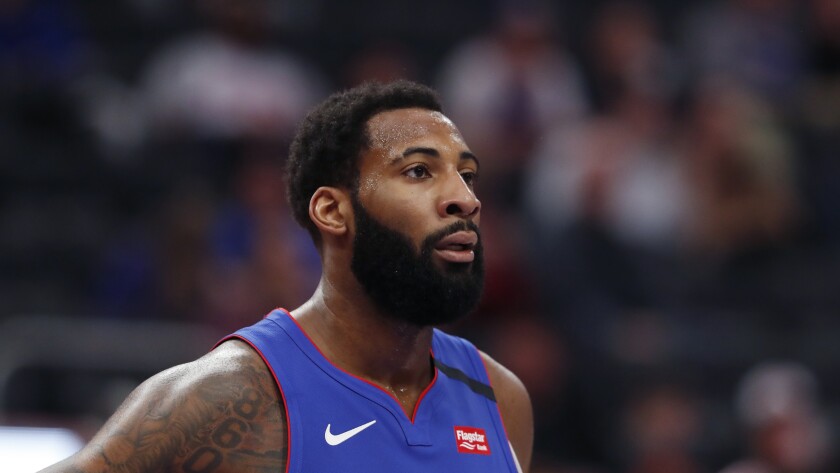 Andre Drummond catches his breath during a break in play.