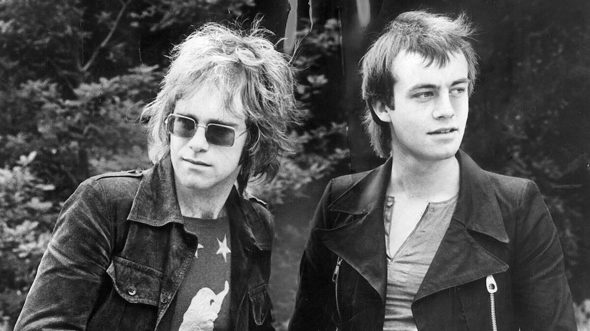 Elton John, left, and Bernie Taupin, photographed in 1970, had met in 1967 with the help of a publisher.