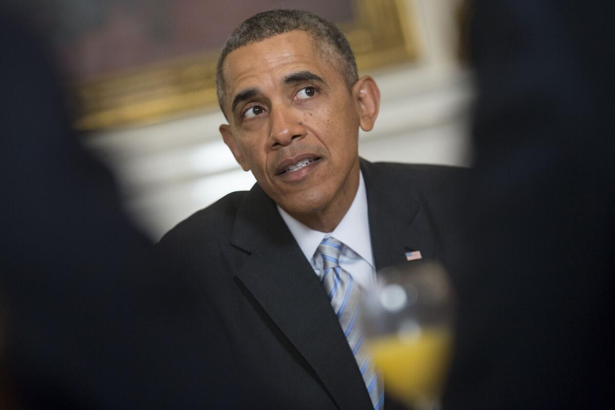 President Obama speaks with members of the Democratic Governors Assn. at the White House on Friday.