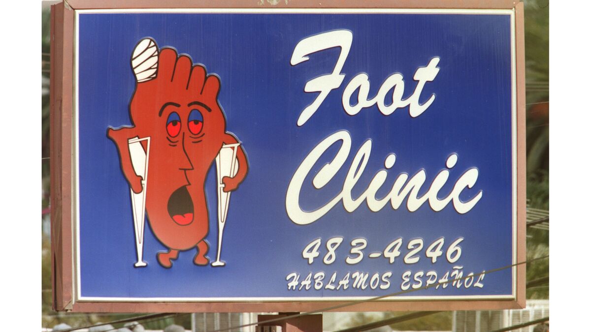The revolving Happy Food Sad Foot Sign has stood at the corner of Sunset Boulevard and Benton Way in Echo Park since 1985. It will be moved to a new location in September.