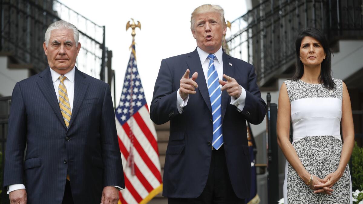 President Trump appears with U.S. Ambassador to the United Nations Nikki Haley and then-Secretary of State Rex Tillerson in Bedminster, N.J., in August 2017.