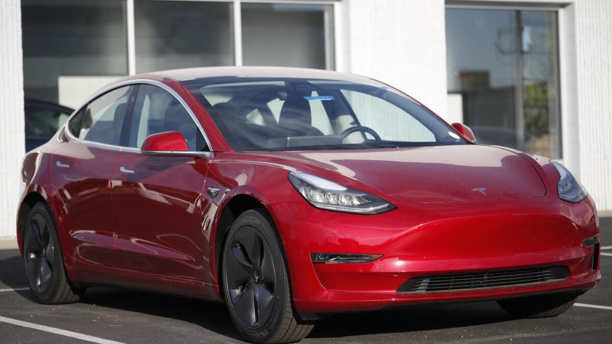 A Model 3 sedan at a Tesla dealership in Littleton, Colo., in May.