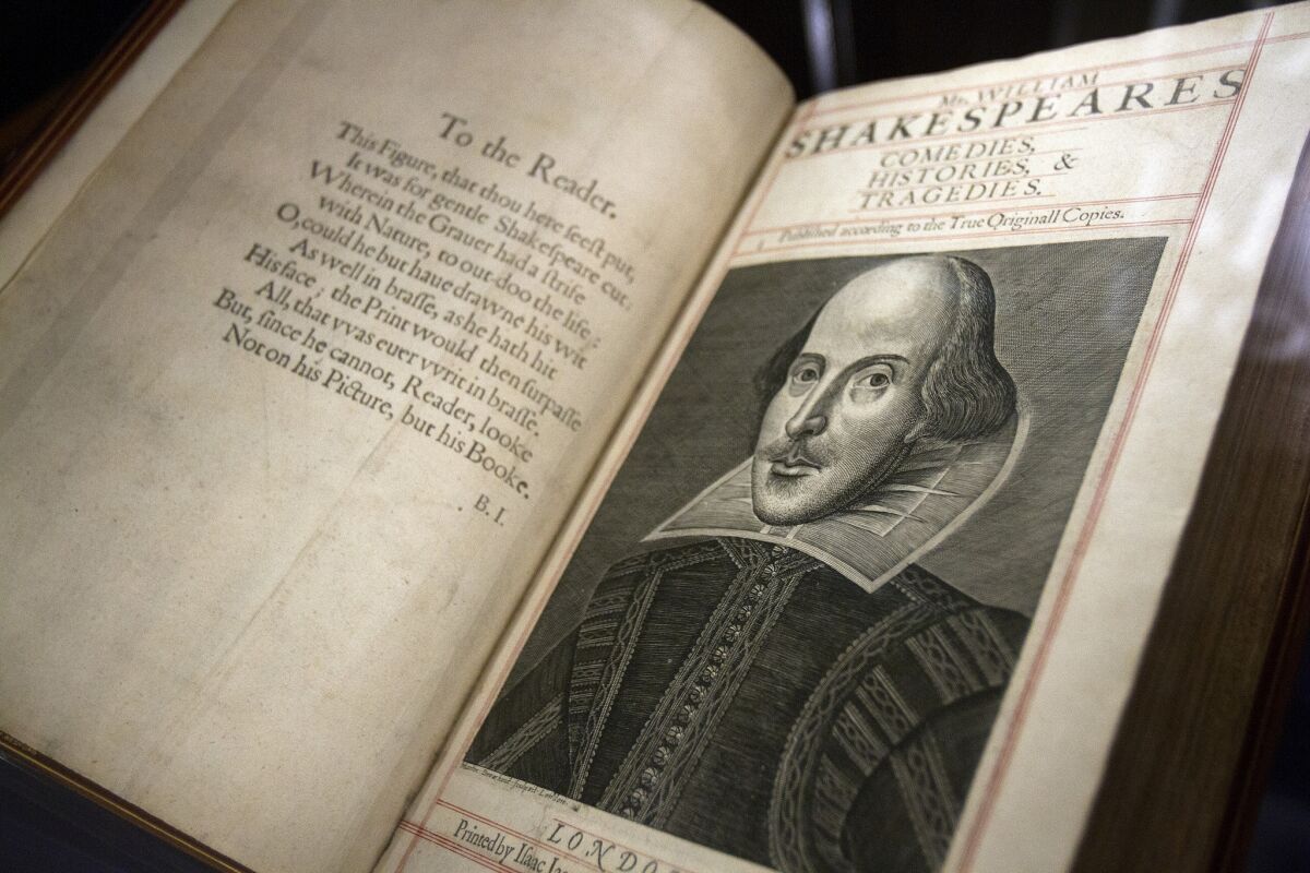 The poet and playwright William Shakespeare is almost certainly the author of a play titled "Double Falsehood," says a new psychological and linguistic analysis. But he may have had some help. Above, an original Bard tome on display at the Huntington in 2013.