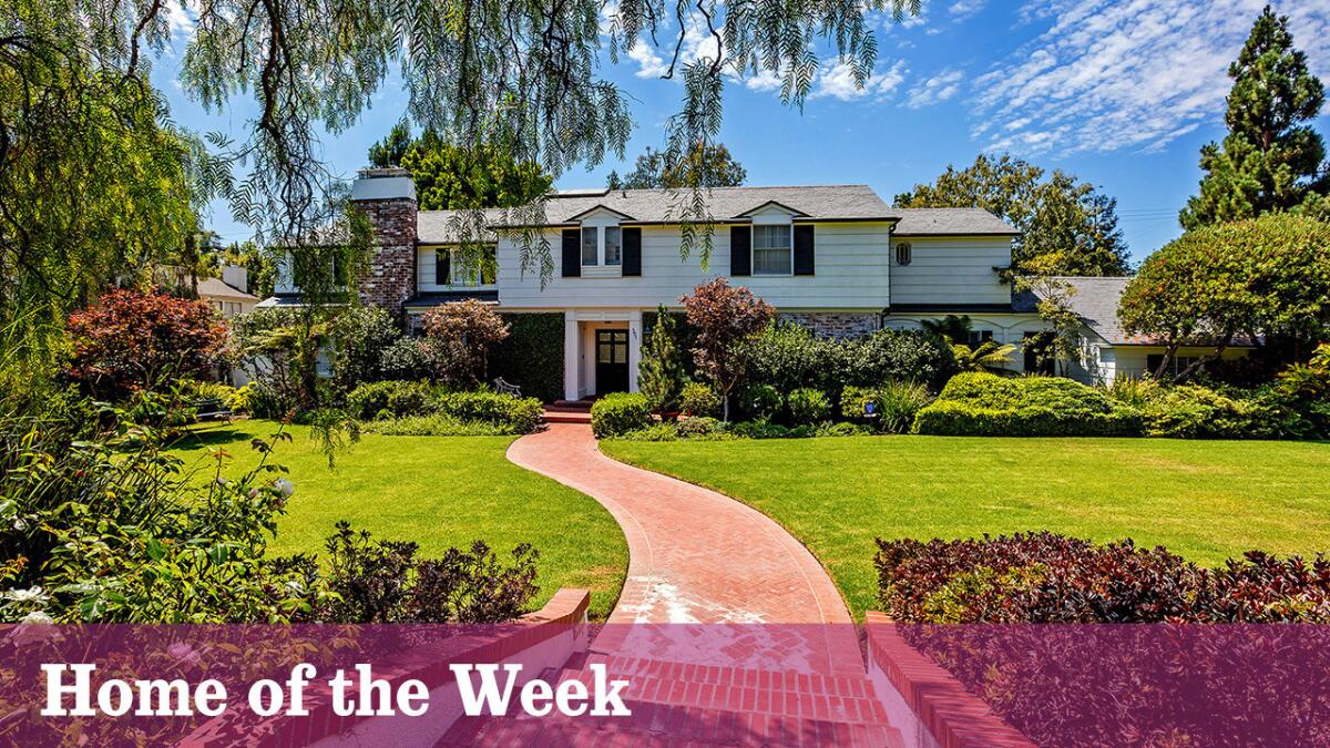 Lush grounds surround the traditional-style home that is for sale at $6.495 million.