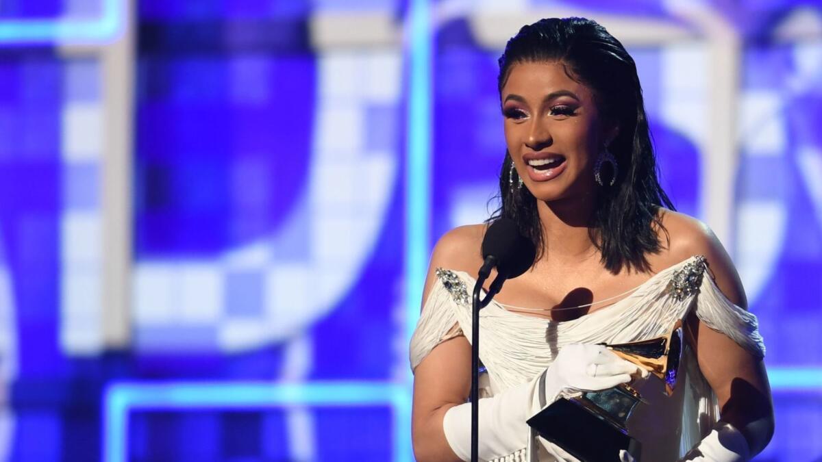 Cardi B accepts the award for rap album onstage during the 61st Annual Grammy Awards.