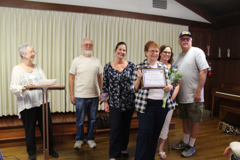 Karen Stangl receives a Lifetime Achievment Award from the Ramona Woman’s Club.