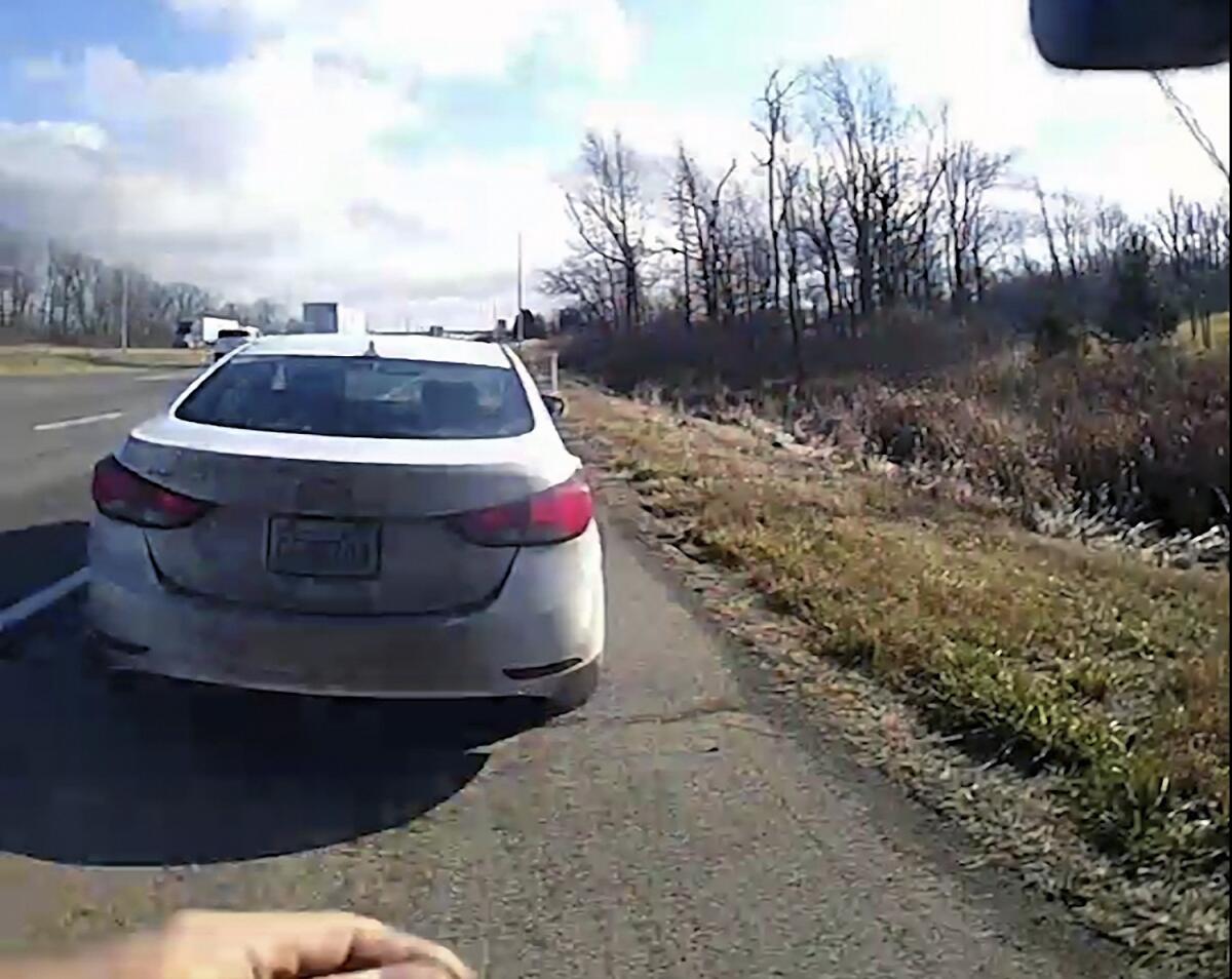 White Hyundai Elantra pulled over by police