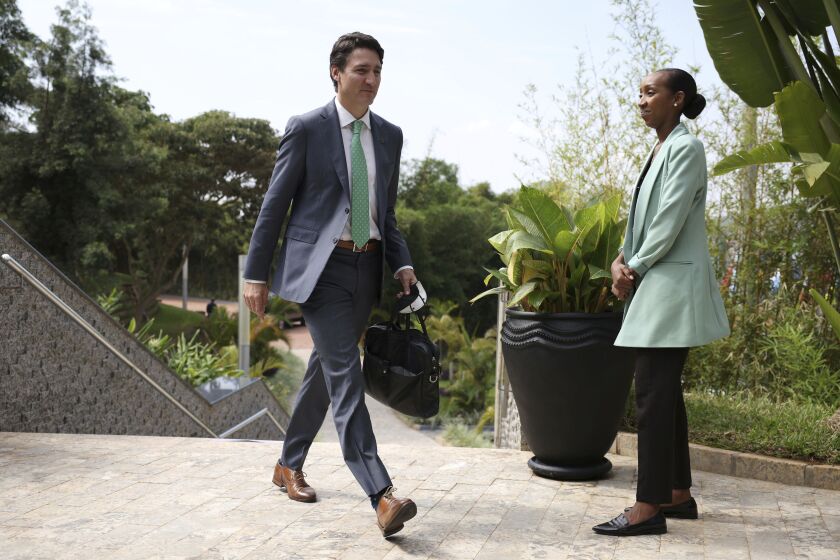 Canada's Prime Minister Justin Trudeau arrives for the Leaders' Retreat on the sidelines of the Commonwealth Heads of Government Meeting at Intare Conference Arena in Kigali, Rwanda, Saturday, June 25, 2022. (Dan Kitwood/Pool Photo via AP)