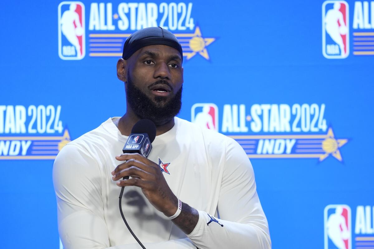 Lakers forward LeBron James speaks during a news conference before the NBA All-Star Game on Sunday.
