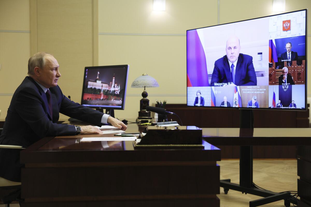 Russian President Vladimir Putin chairing a video meeting