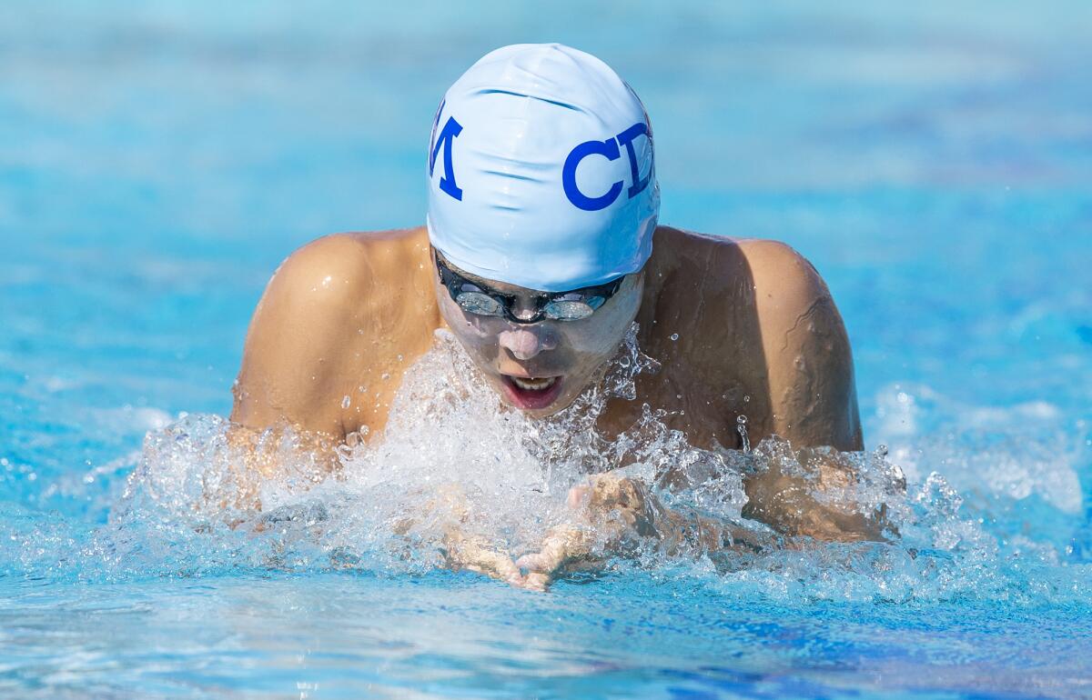 Corona del Mar's Kevin Li swims the breaststroke in the boys' 200 individual medley during the annual Battle of the Bay meet.