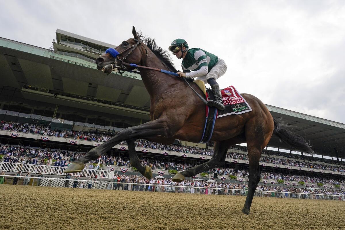 Flightline, with jockey Flavien Prat aboard, wins the Hill 'N' Dale Metropolitan at Belmont Park on June 11.